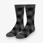 Mod and Tone – A pair of grey and black argyle socks on a white background.